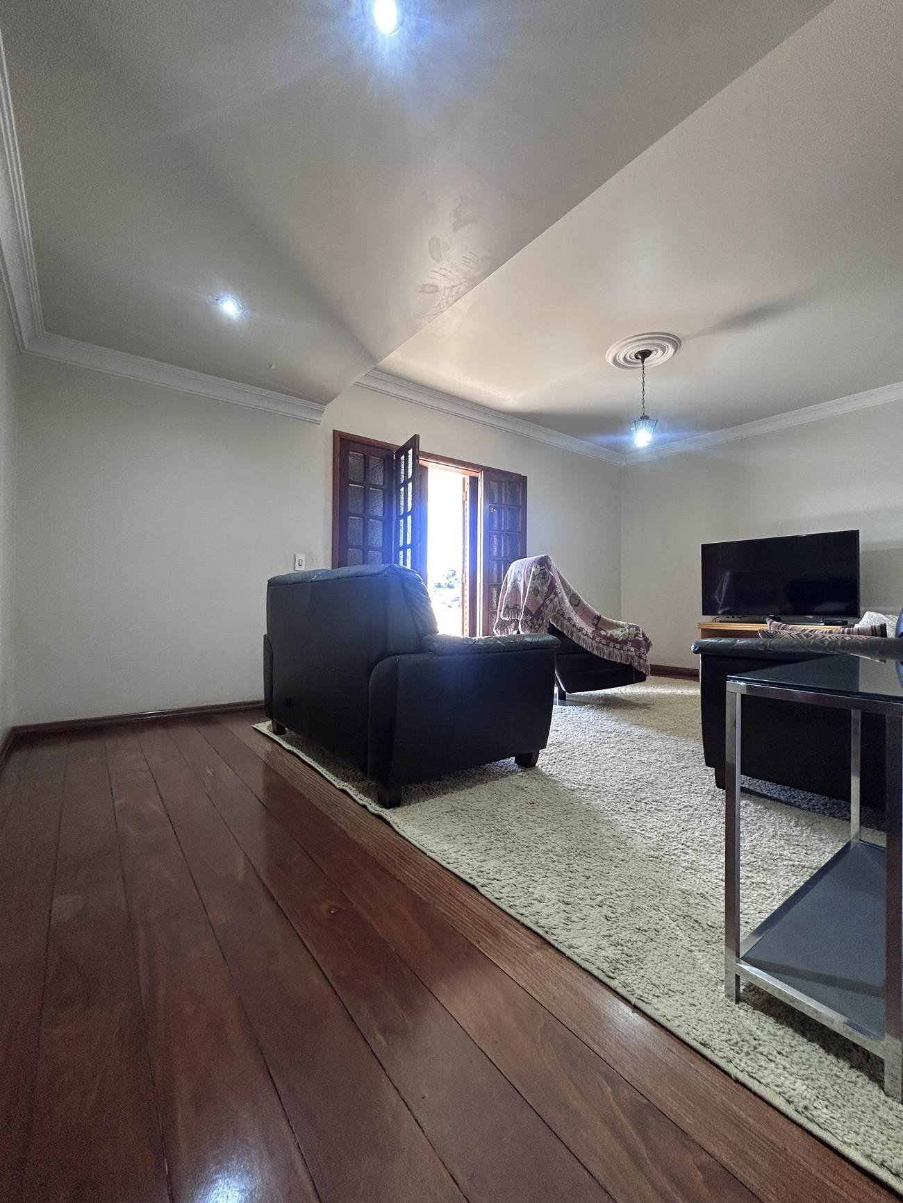 Sala de TV reservada, integrada à varanda